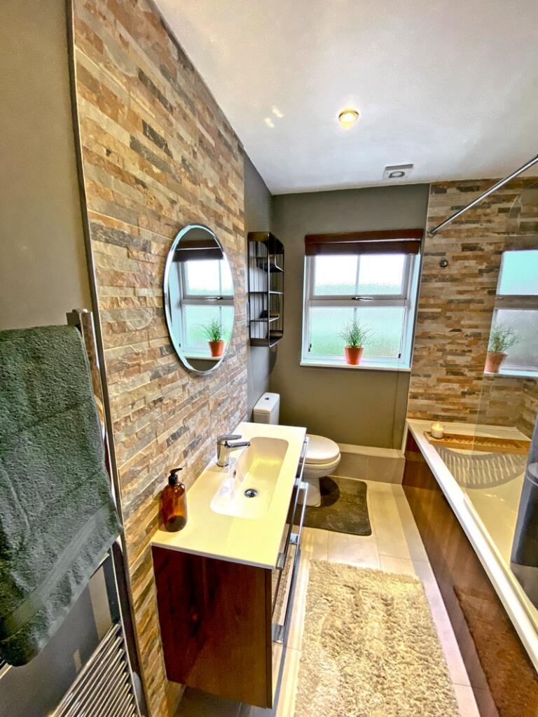 Experience a beautifully designed bathroom suit...