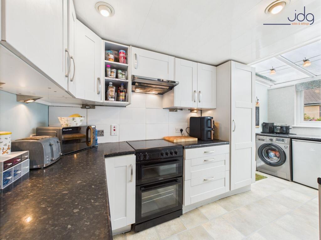Modern shaker-style kitchen and Velux windows