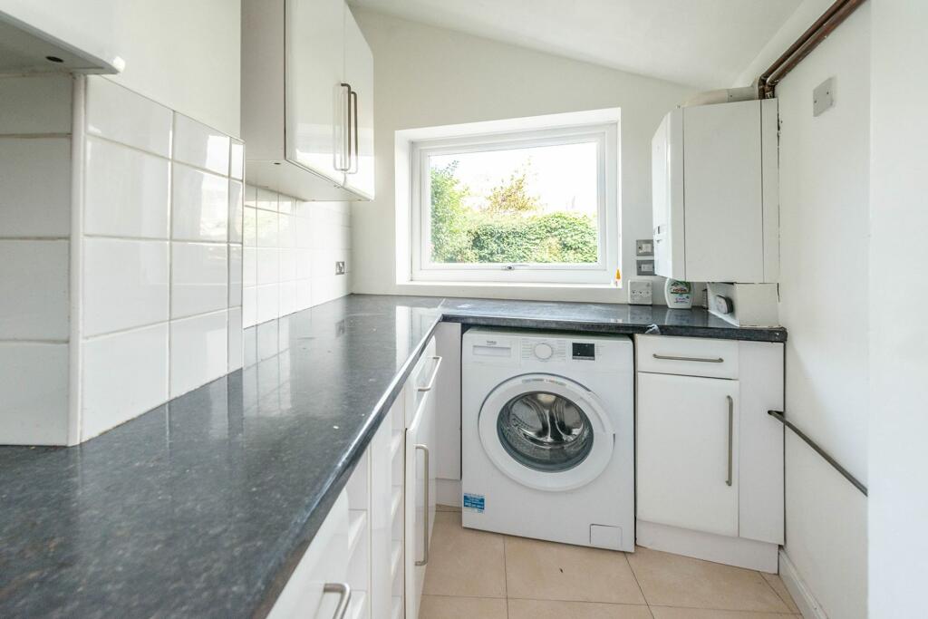 SITTING, DINING ROOM, KITCHEN AND UTILITY