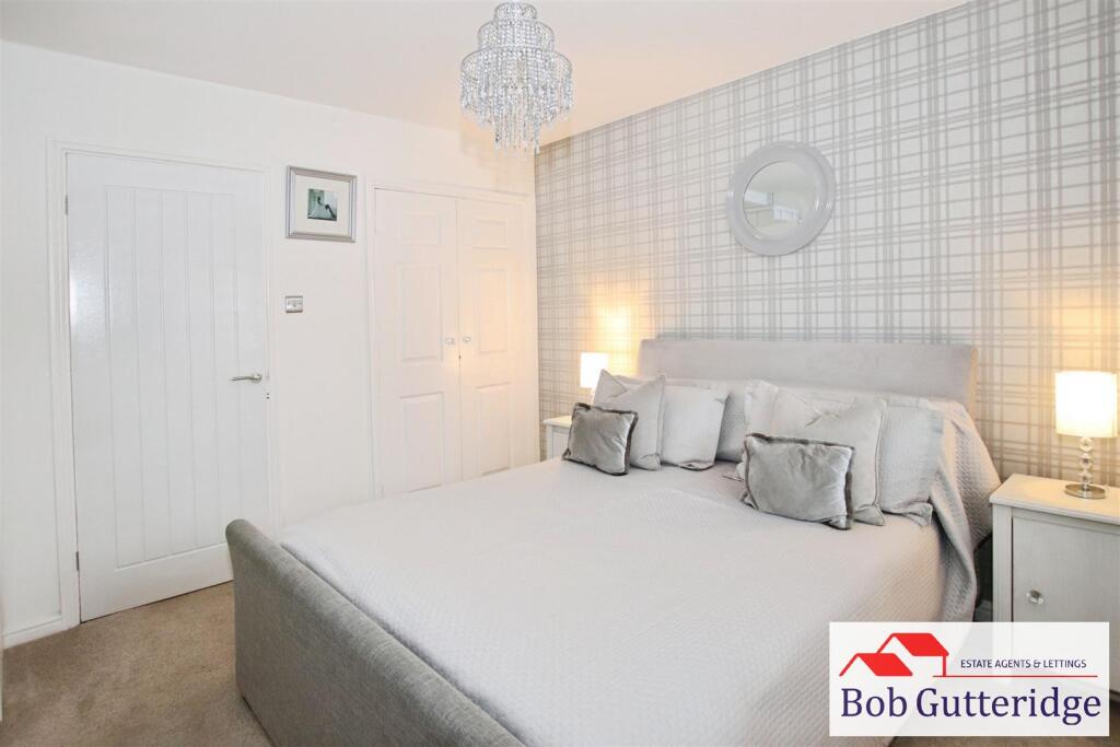 BEDROOM ONE (FRONT)
