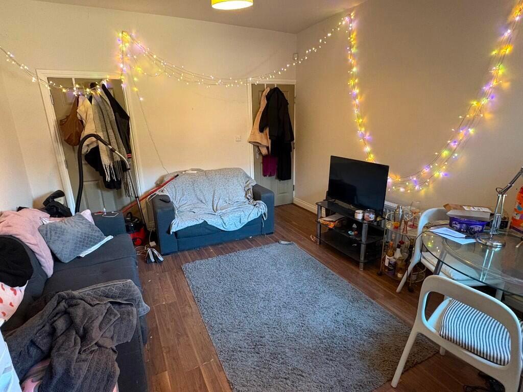 A cozy and inviting living room featuring warm ...