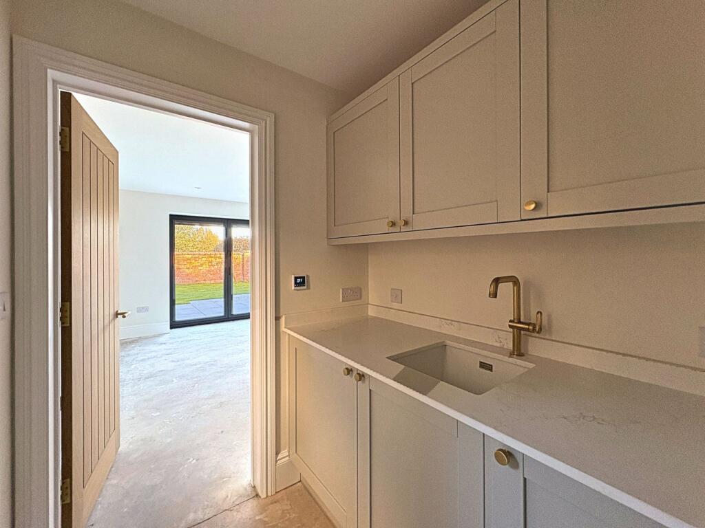 Adjoining Utility Room 