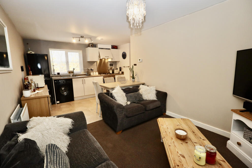 Living area through to kitchen