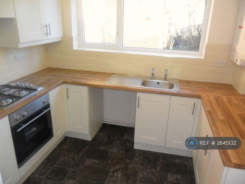 Kitchen With Bulit In Cooker And Hob.