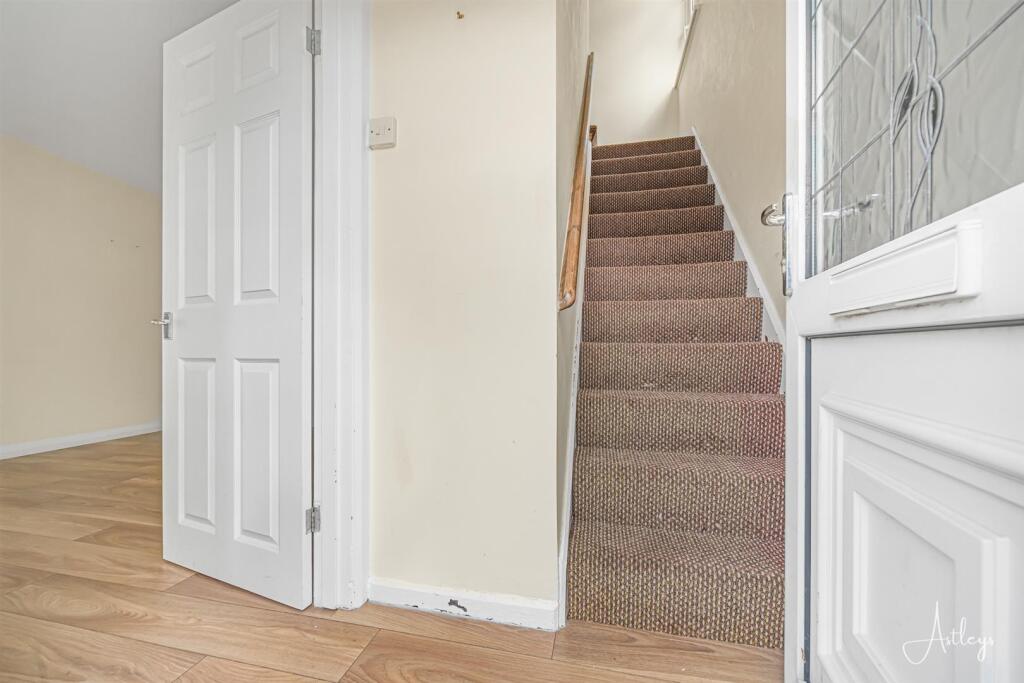 Double glazed front entrance door into: