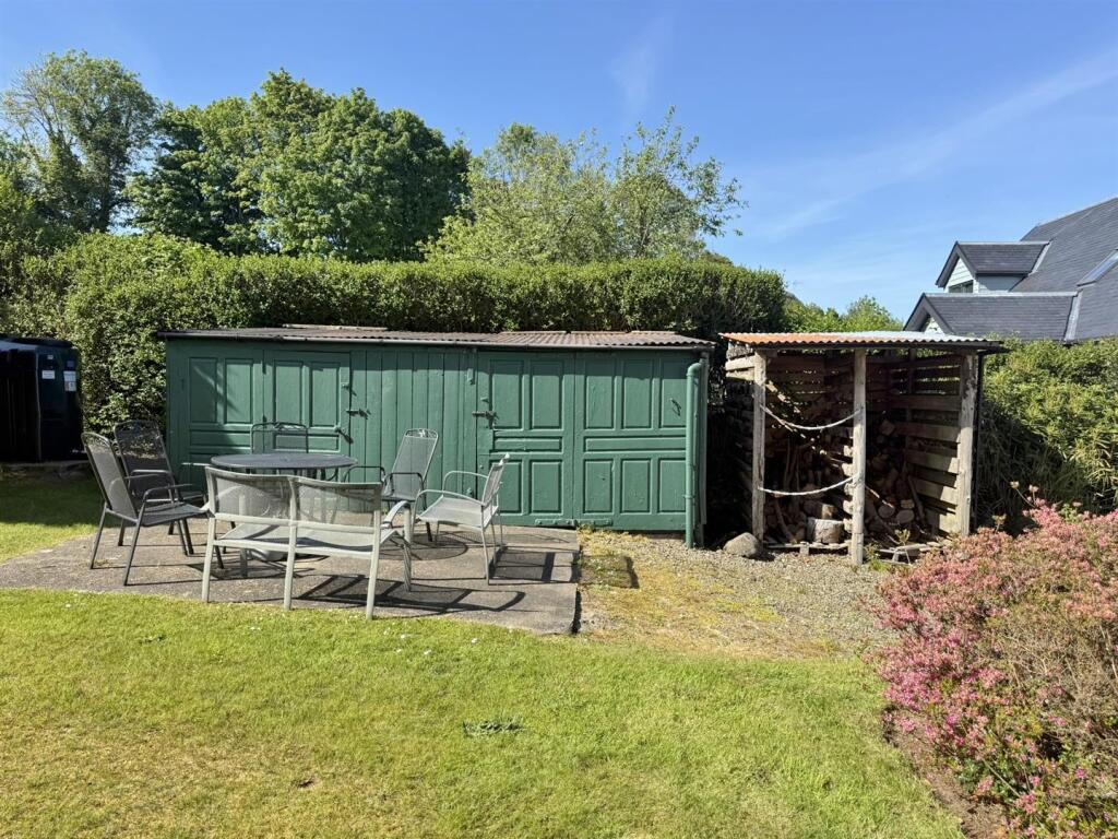 Patio area and outbuildings