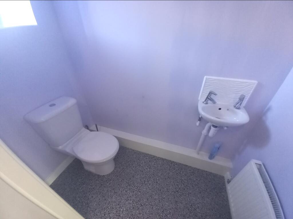 GROUND FLOOR CLOAKROOM WC