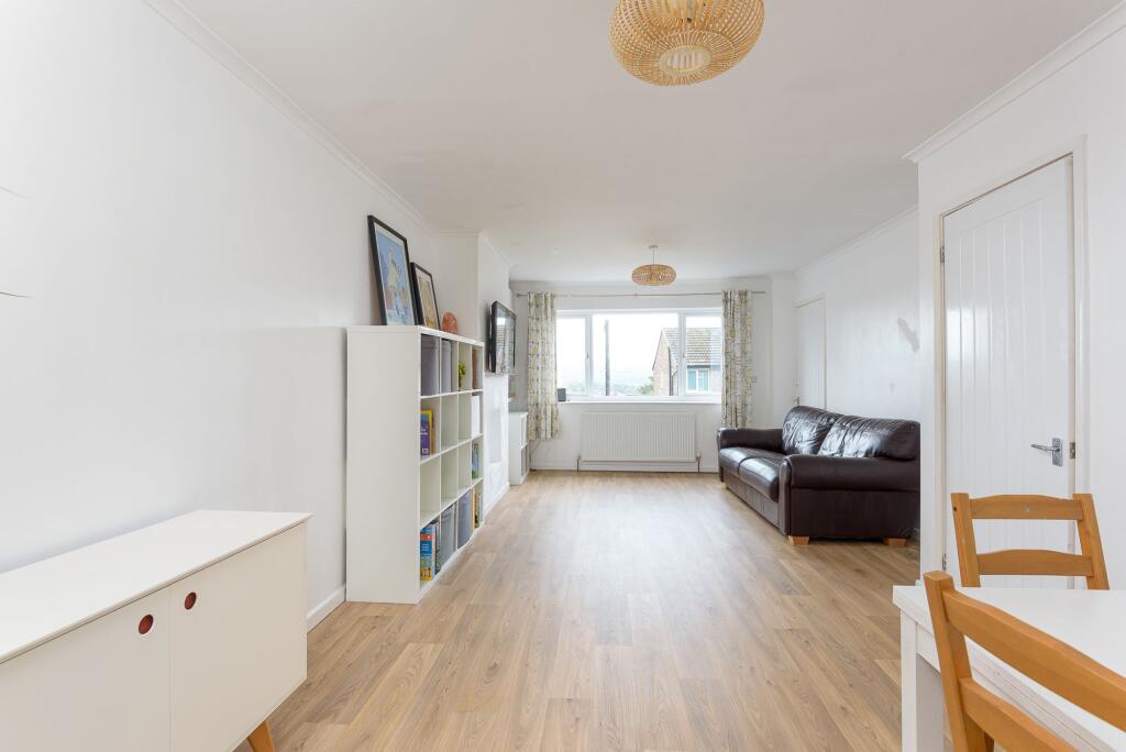 KITCHEN SITTING ROOM AND DINING ROOM