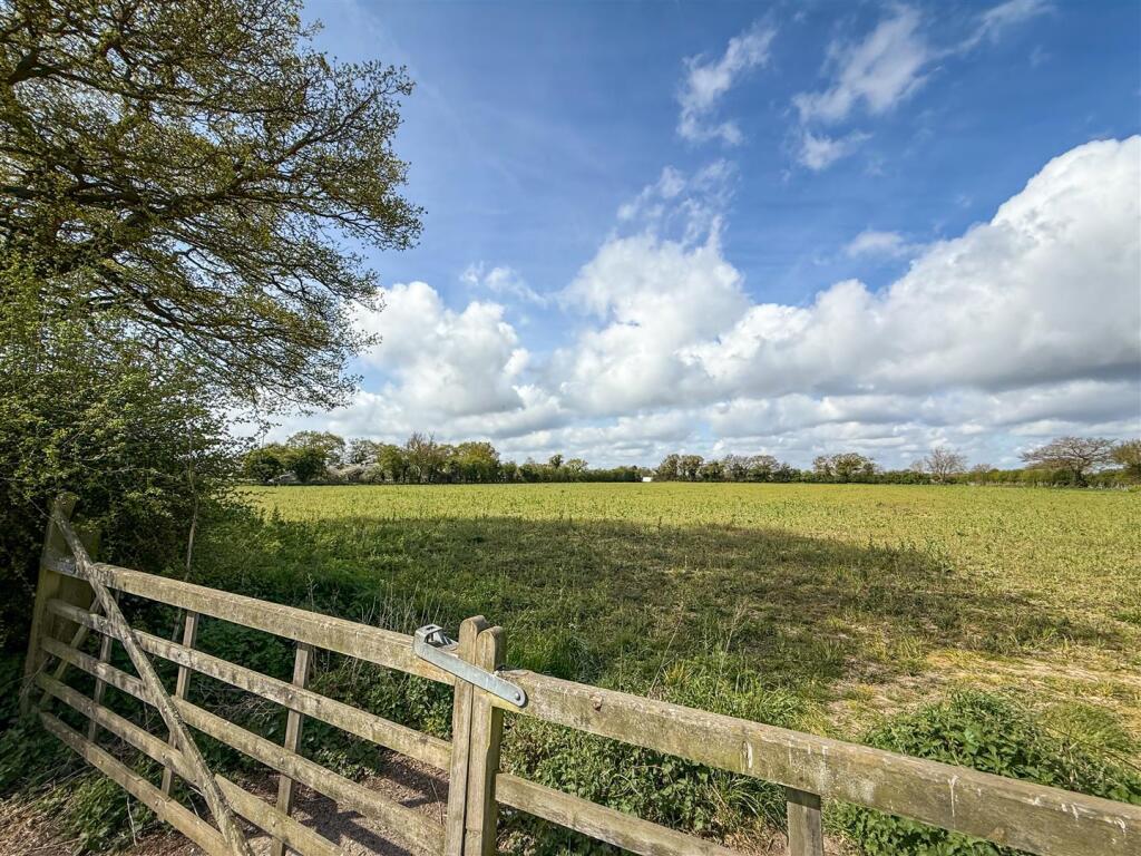 FIELDS TO REAR