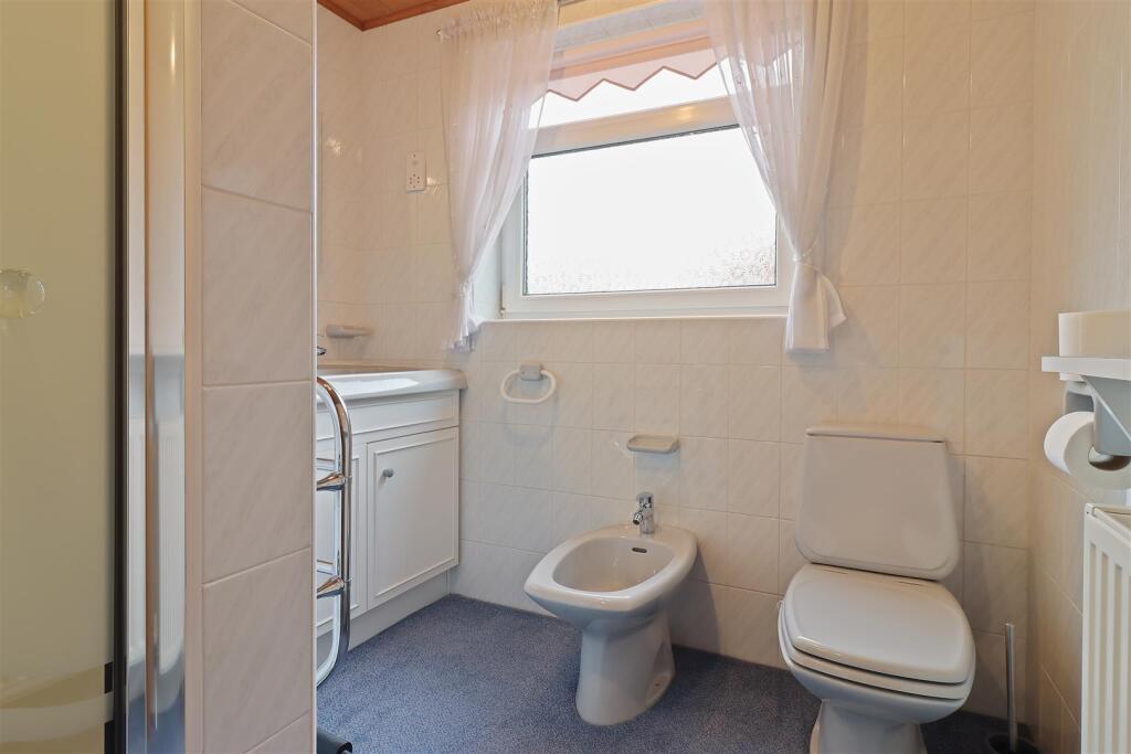 Fully Tiled Shower Room