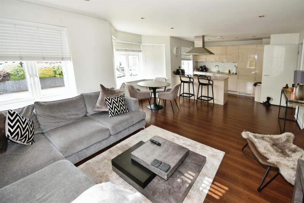 LIVING/DINING AND KITCHEN AREA