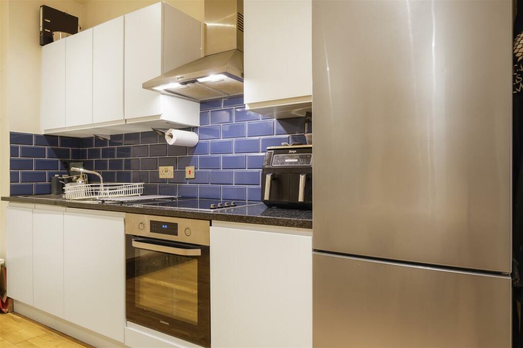 Fitted kitchen with granite worktops