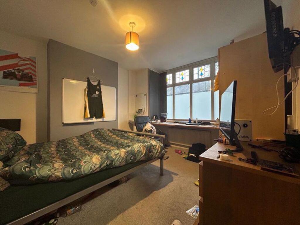 A spacious double bedroom featuring good natura...