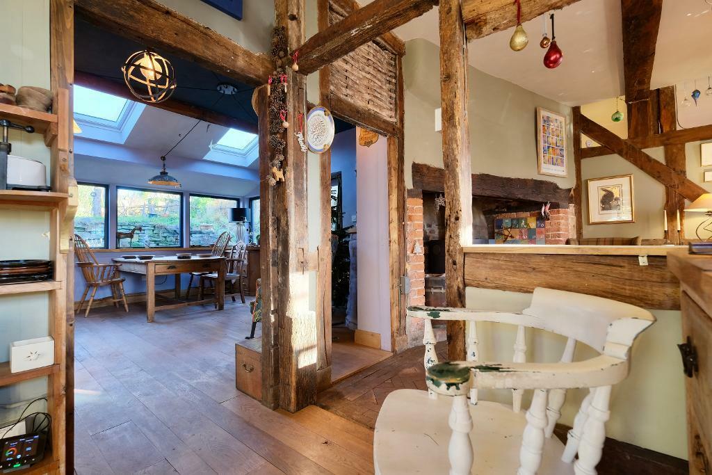 Kitchen, through to snug and garden room