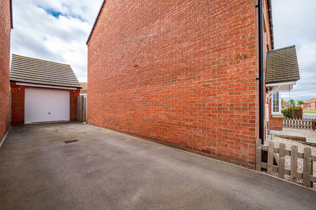 Driveway/Detached Single Garage