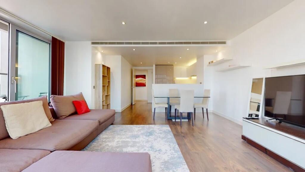 Bright and spacious contemporary living room fe...