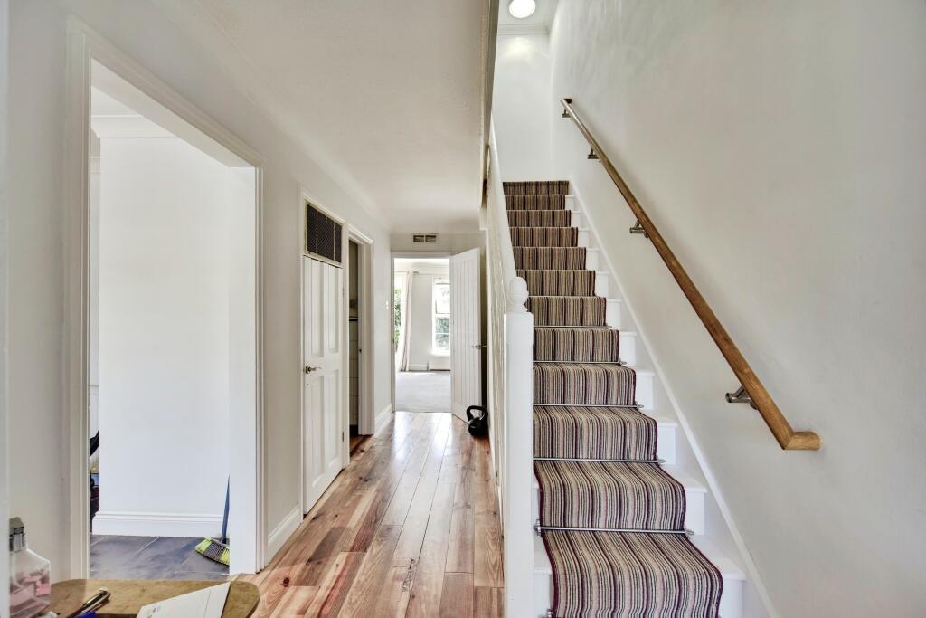 Entrance Hallway With Staircase View