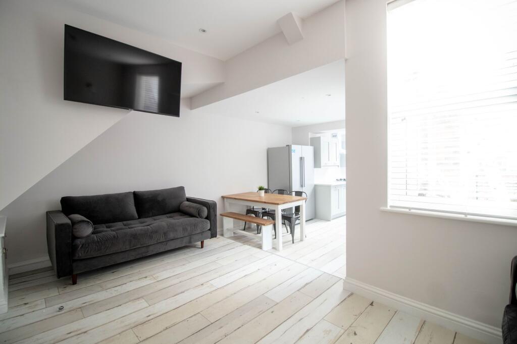 Bright and airy living space featuring a modern...