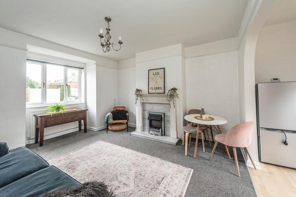 SITTING ROOM AND KITCHEN