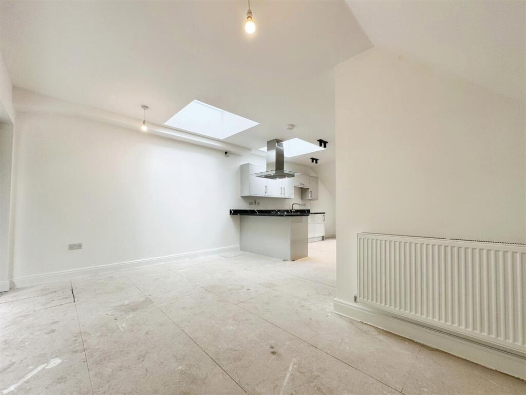 Living area to kitchen (2)