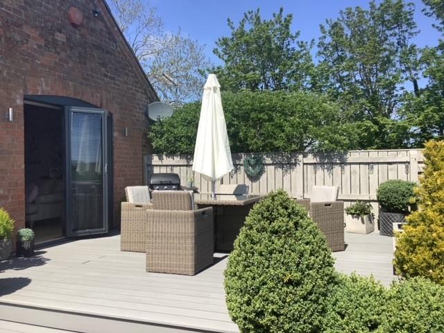 Rear garden patio area.jpg