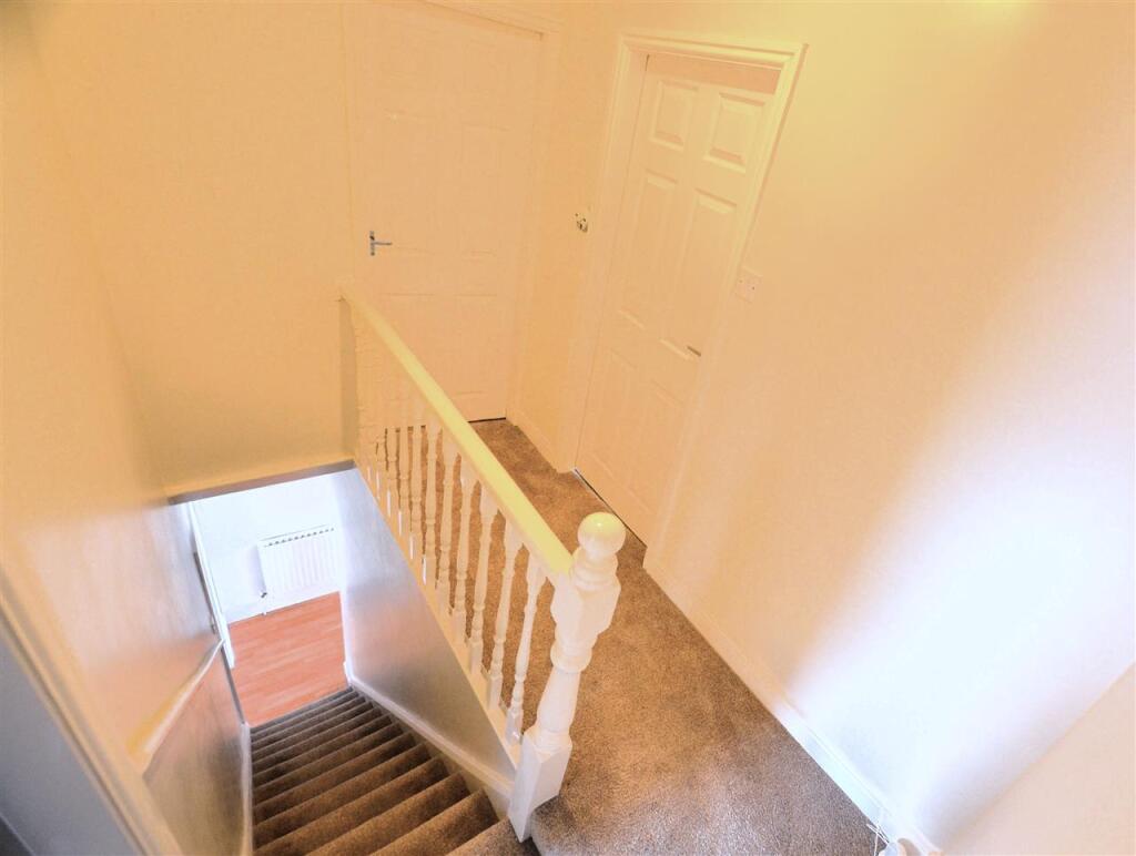 FIRST FLOOR LANDING.