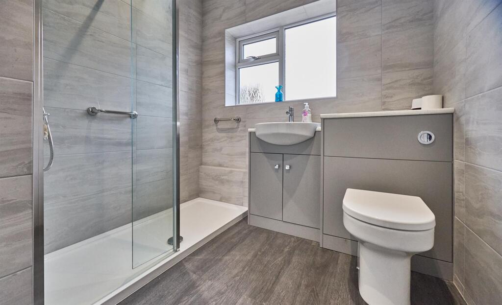 Refitted shower room to rear