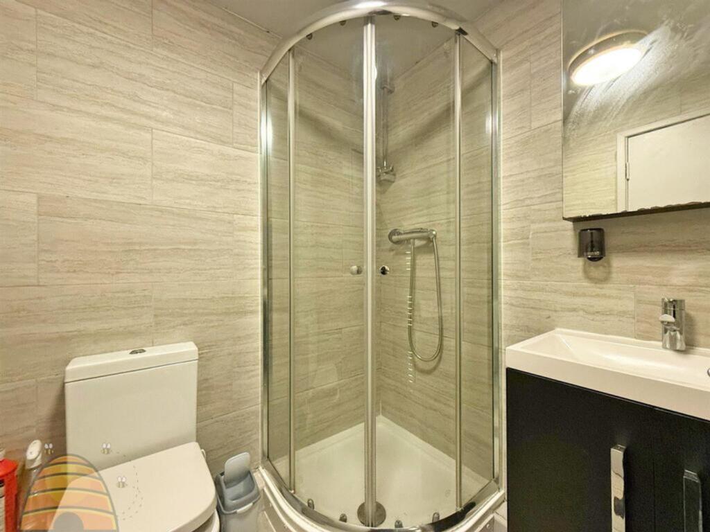 A modern and clean bathroom featuring a stylish...
