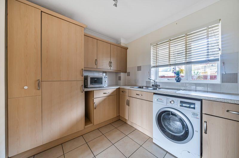 Kitchen with built-in appliances