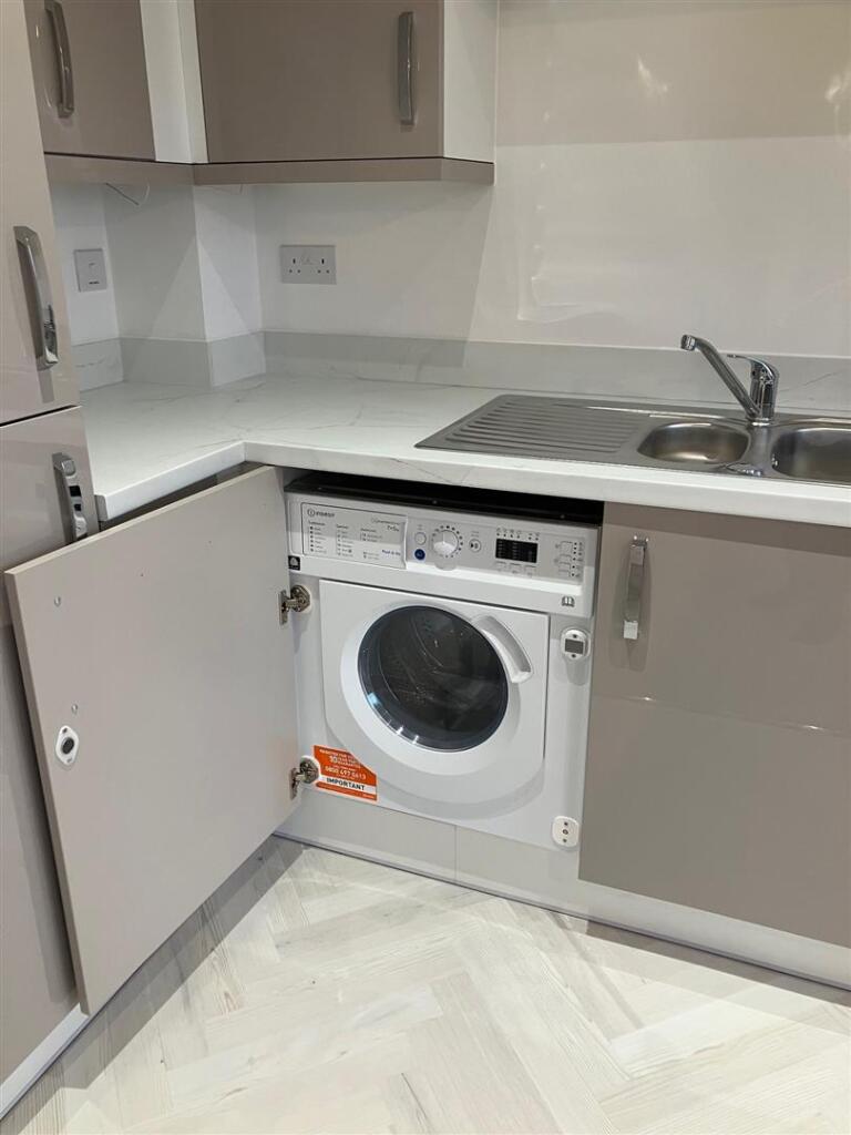 Integrated washer dryer