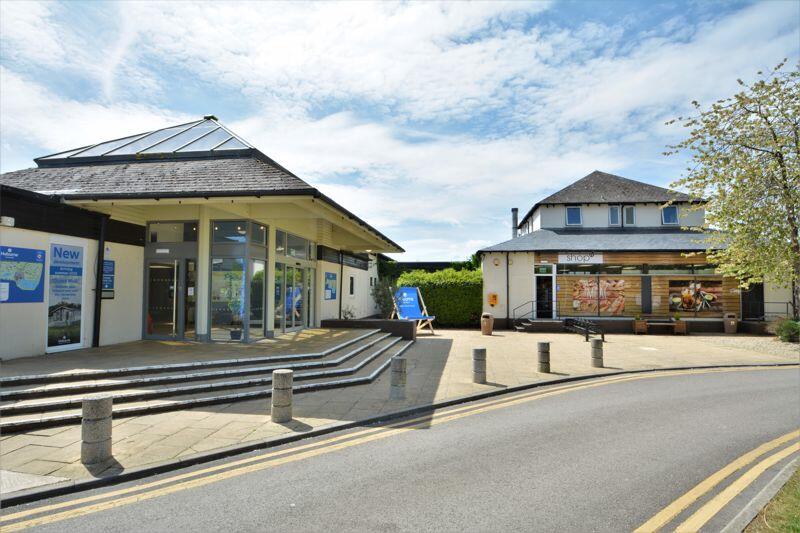 Entrance to complex and shop