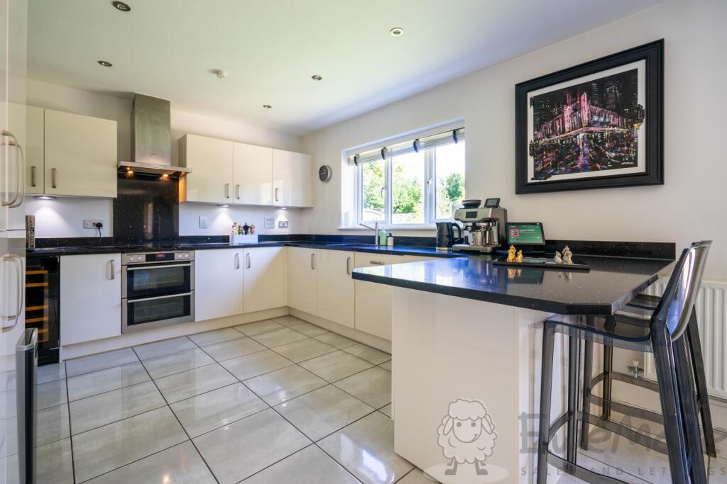 Fully Integrated Kitchen with Breakfast Bar