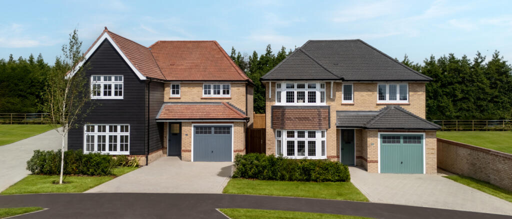 Redrow external image of two detached homes at Greenways in Betteshanger