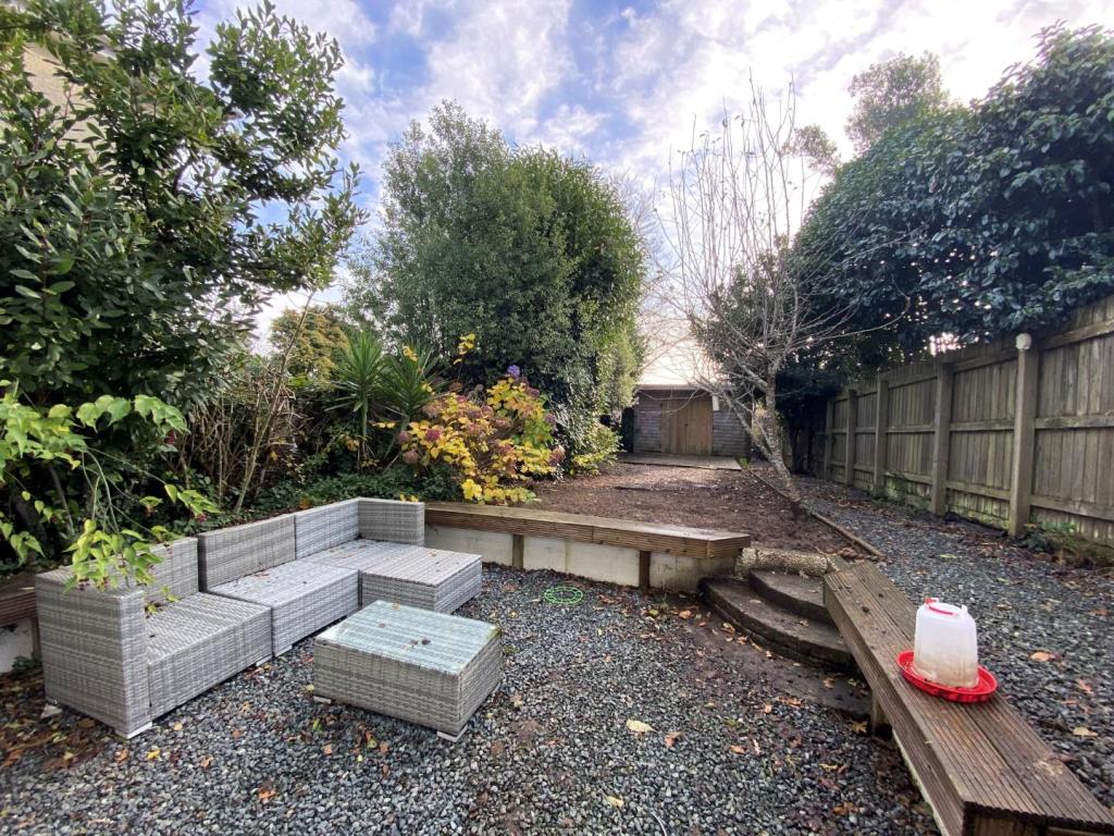 Rear gravel sitting area and garden