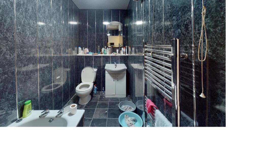 A clean and well-maintained bathroom with a mod...