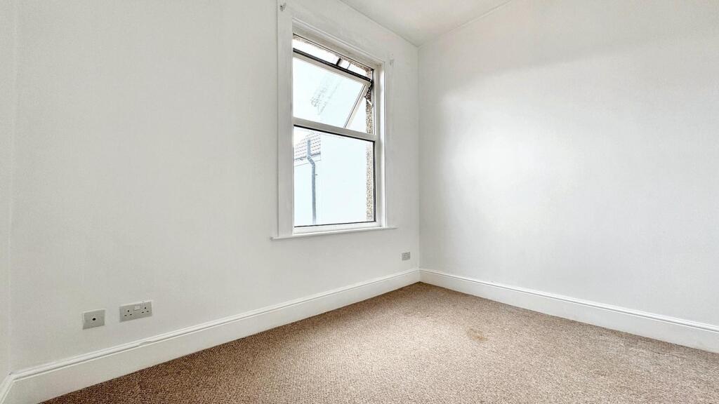 Bright and inviting double bedroom featuring a ...