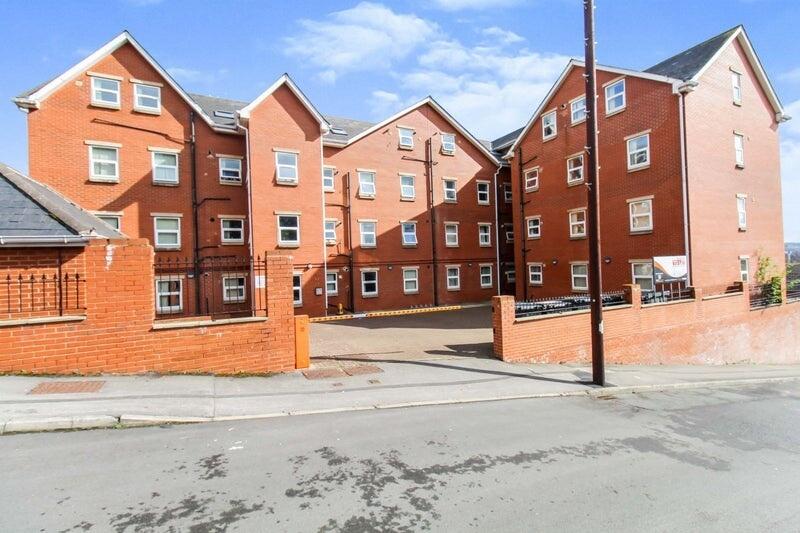 Bright and well-maintained exterior of a modern...