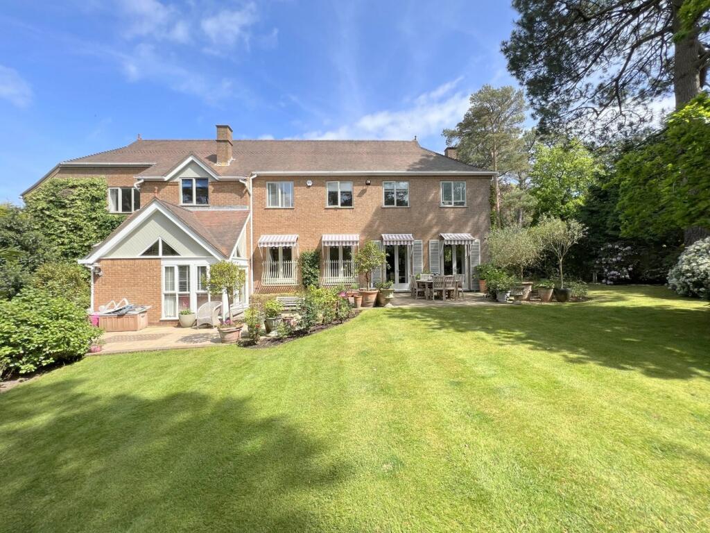 Rear elevation/garden in summer