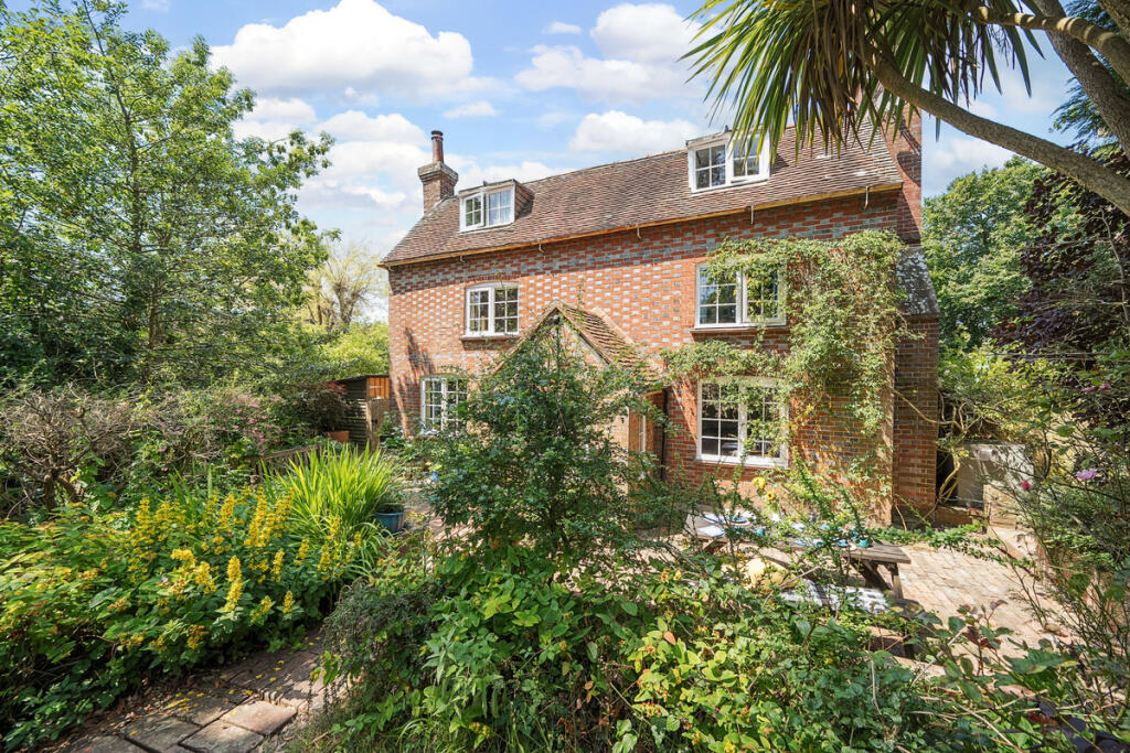 Attractive front elevation and private front garden