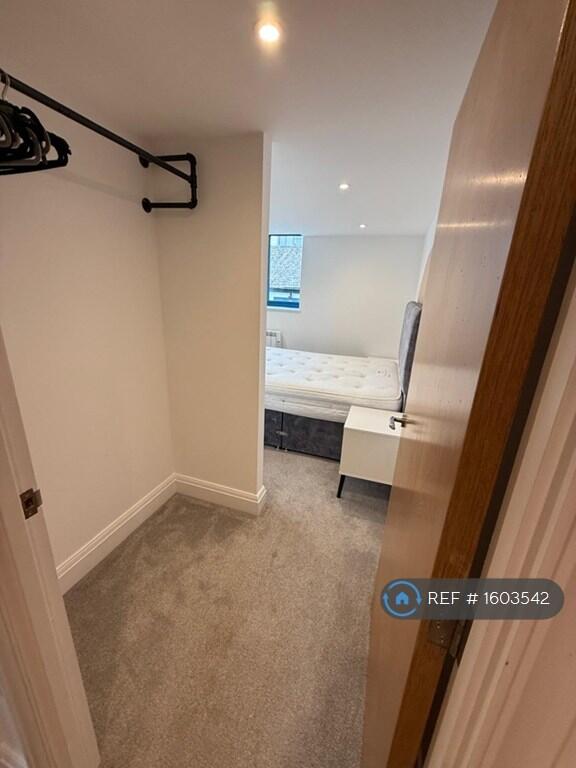 Open Closet Bedroom One