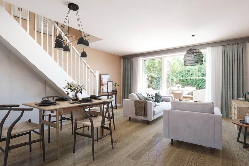 Light flooding into the living room from the large french doors
