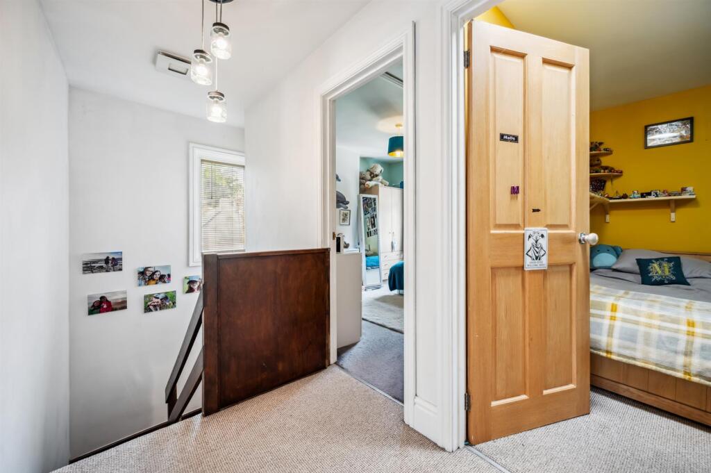 First floor landing to Bedrooms One and Two.jpg