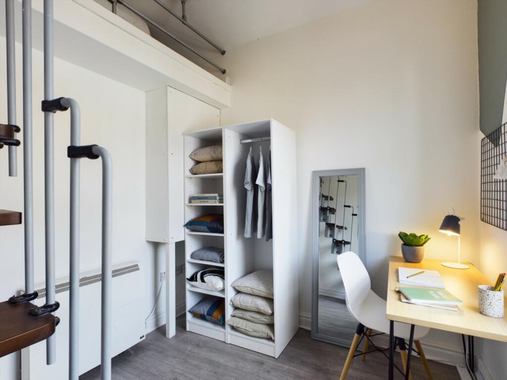 A tidy and well-organized small storage area fe...