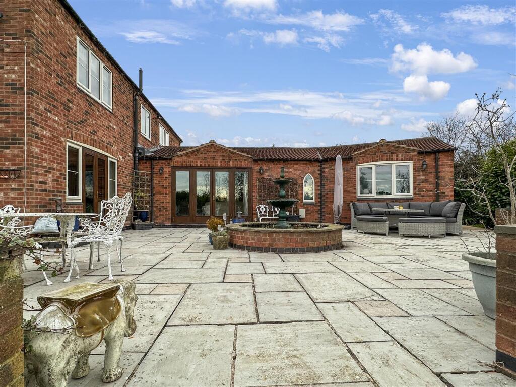 Extensive Paved Outdoor Entertainment Area 158