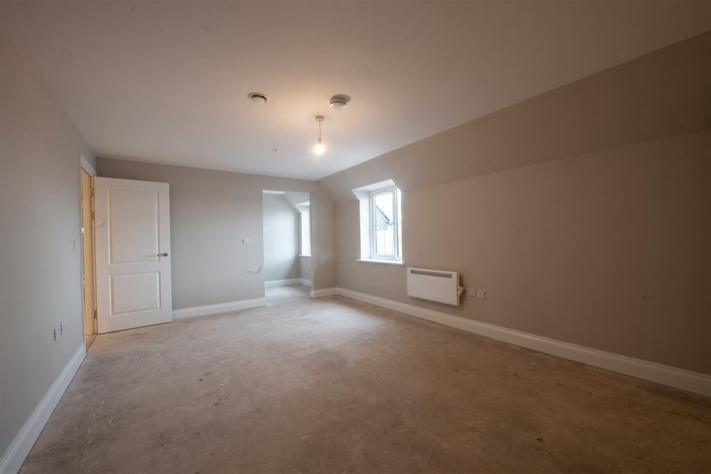 Bedroom one with dressing area