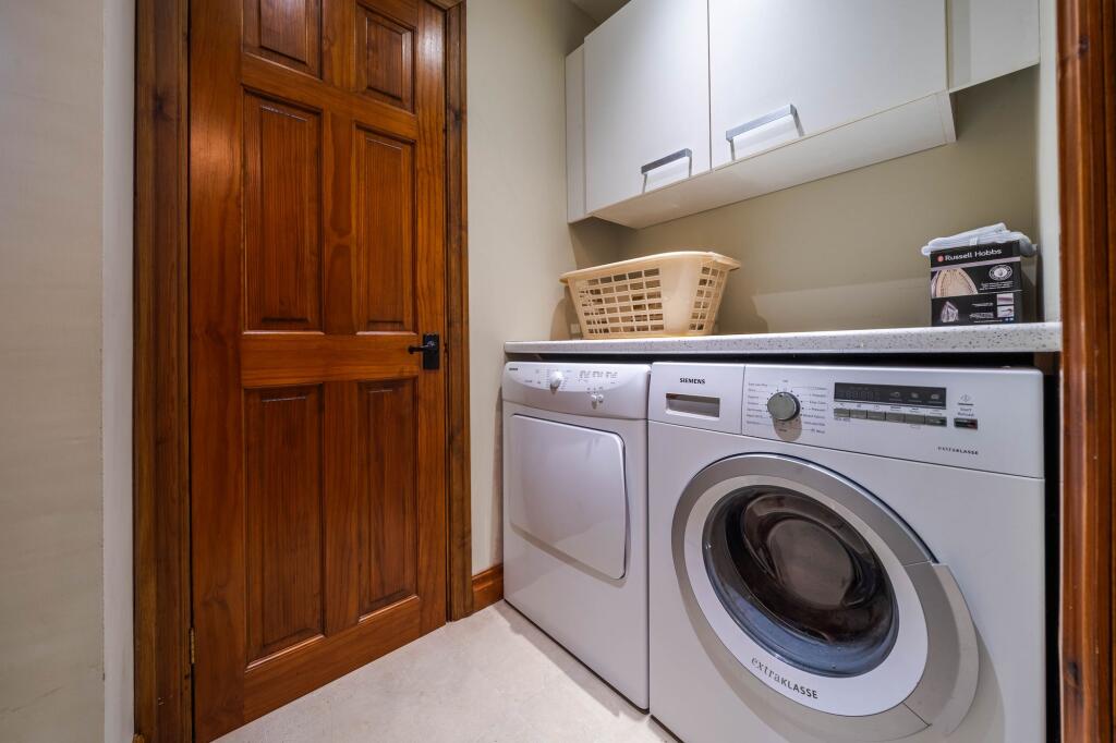 DOWNSTAIRS TOILET/UTILITY ROOM