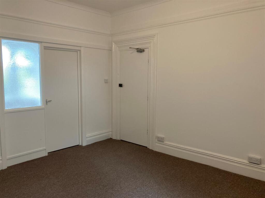front flat, 24 The Parade - front room 4.jpg