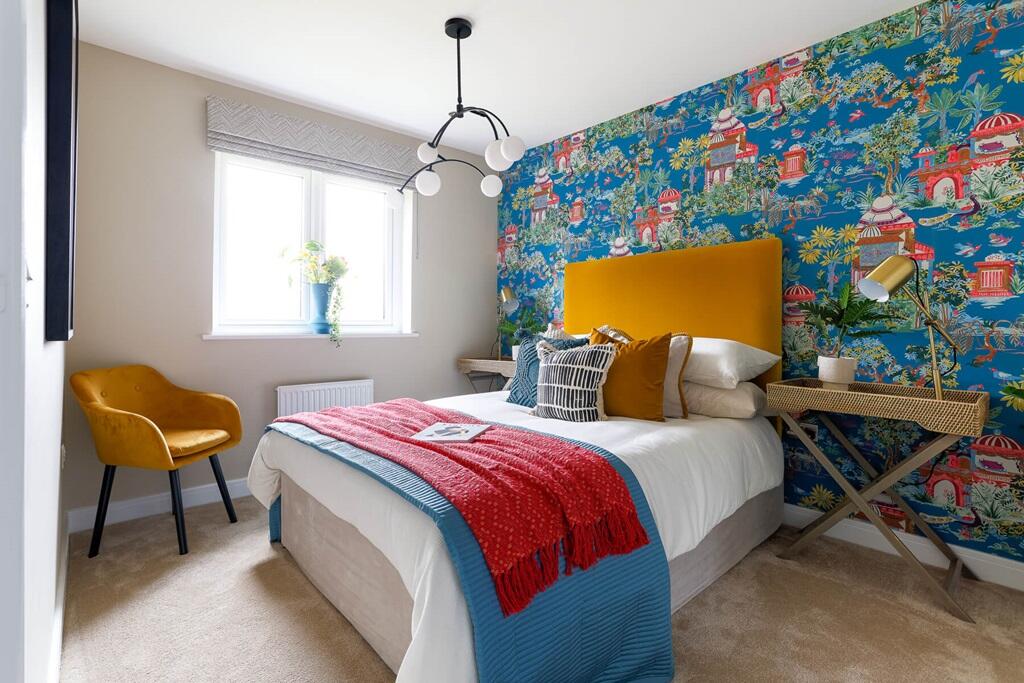 Double bedroom looks out onto the rear harden