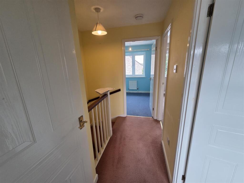 STAIRS AND FIRST FLOOR LANDING