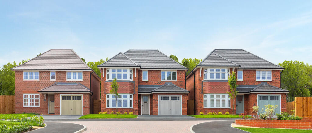 Three modern red-brick houses with grey tiled roofs, white window frames, and small front gardens on